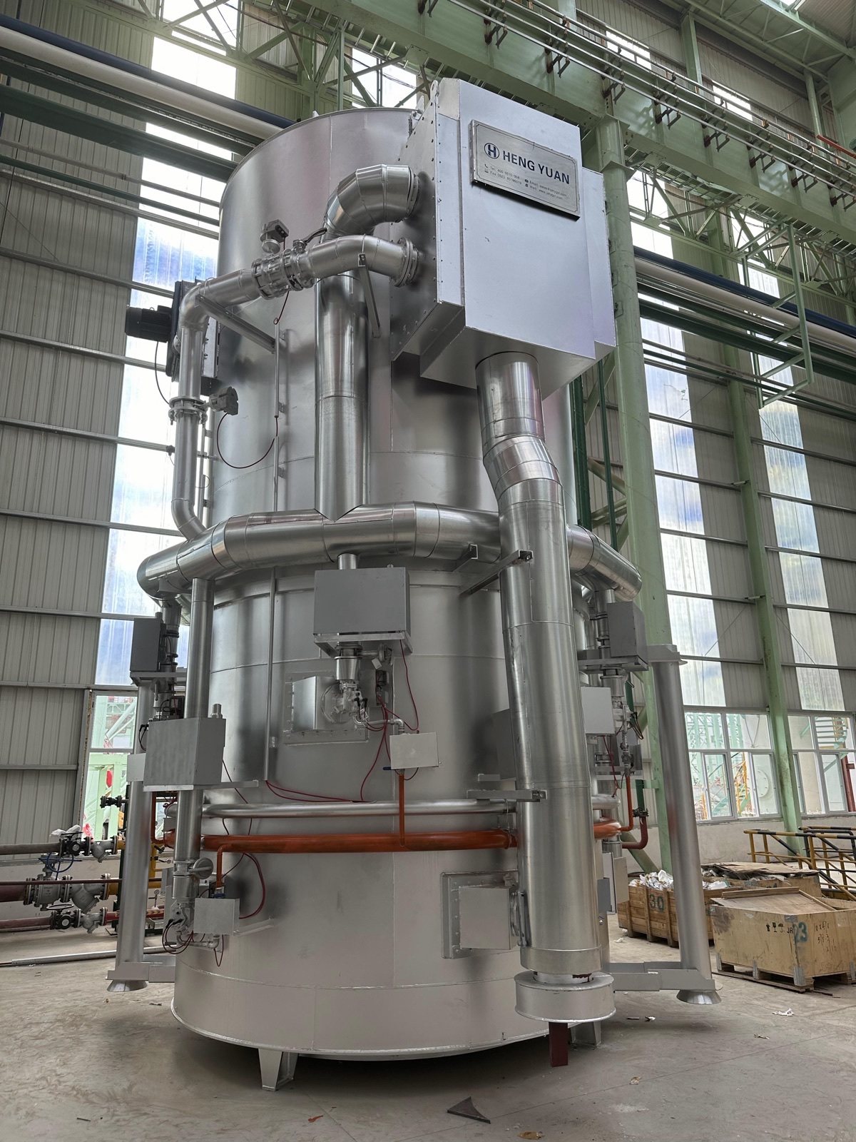 Equipment detail showing circulation, piping and control interfaces on a Hengyuan bell-type furnace.